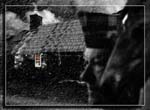 Cottage in the rain